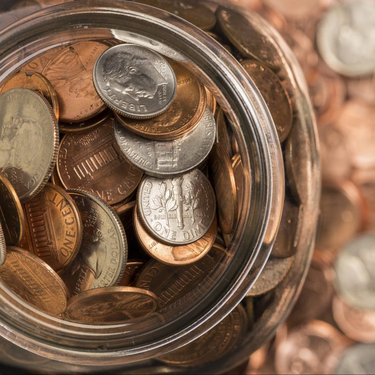 glass car filled with coins